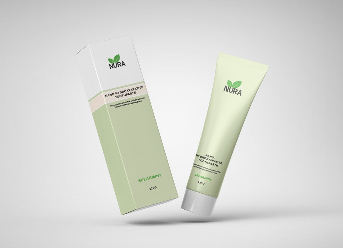 Nura toothpaste tube and packaging on a light gray background